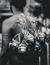 Close-up of lighting equipment hanging on metal