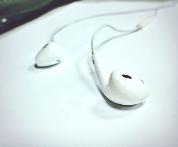 Close-up of white object over white background