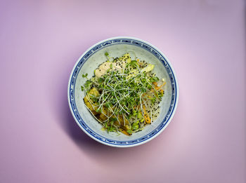 High angle view of salad in bowl on table