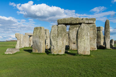 Built structure on field against sky