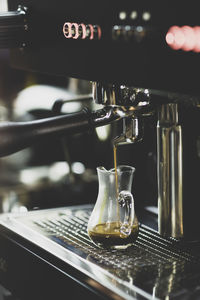 Close-up of coffee cup on table in cafe