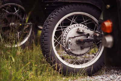 Vintage motorcycle tire on grass