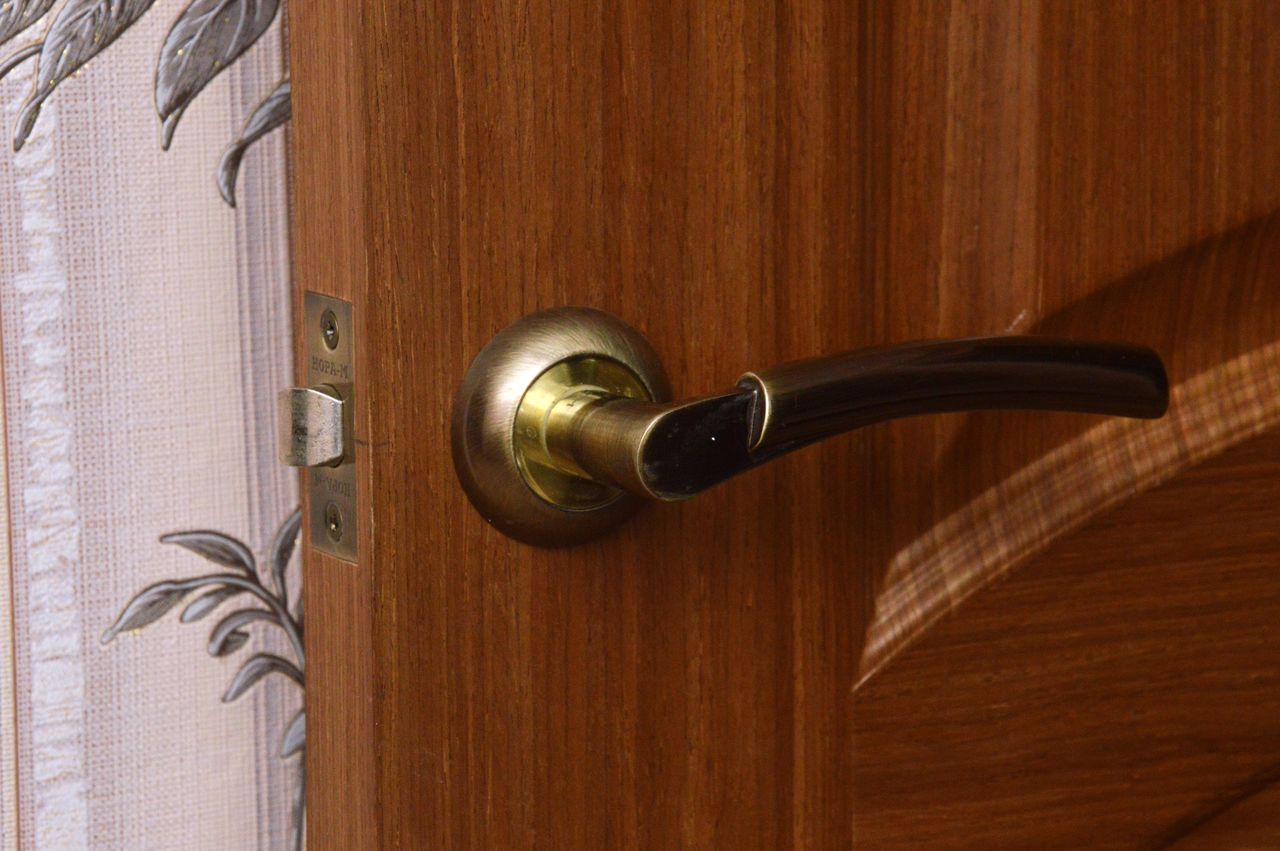 door handle, wood, door, entrance, knob, doorknob, indoors, no people, brown, handle, security, protection, home interior