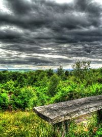 Scenic view of landscape against cloudy sky