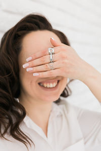 Close-up of young woman using mobile phone