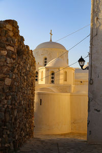 Exterior of historic building against clear sky