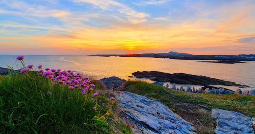 Scenic view of sea against sky during sunset