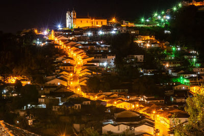 High angle view of illuminated buildings at night