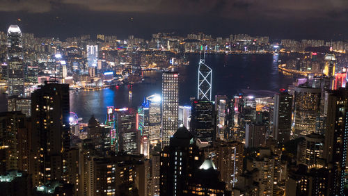 Aerial view of illuminated city buildings