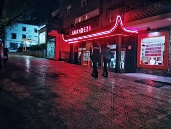 People in city at night