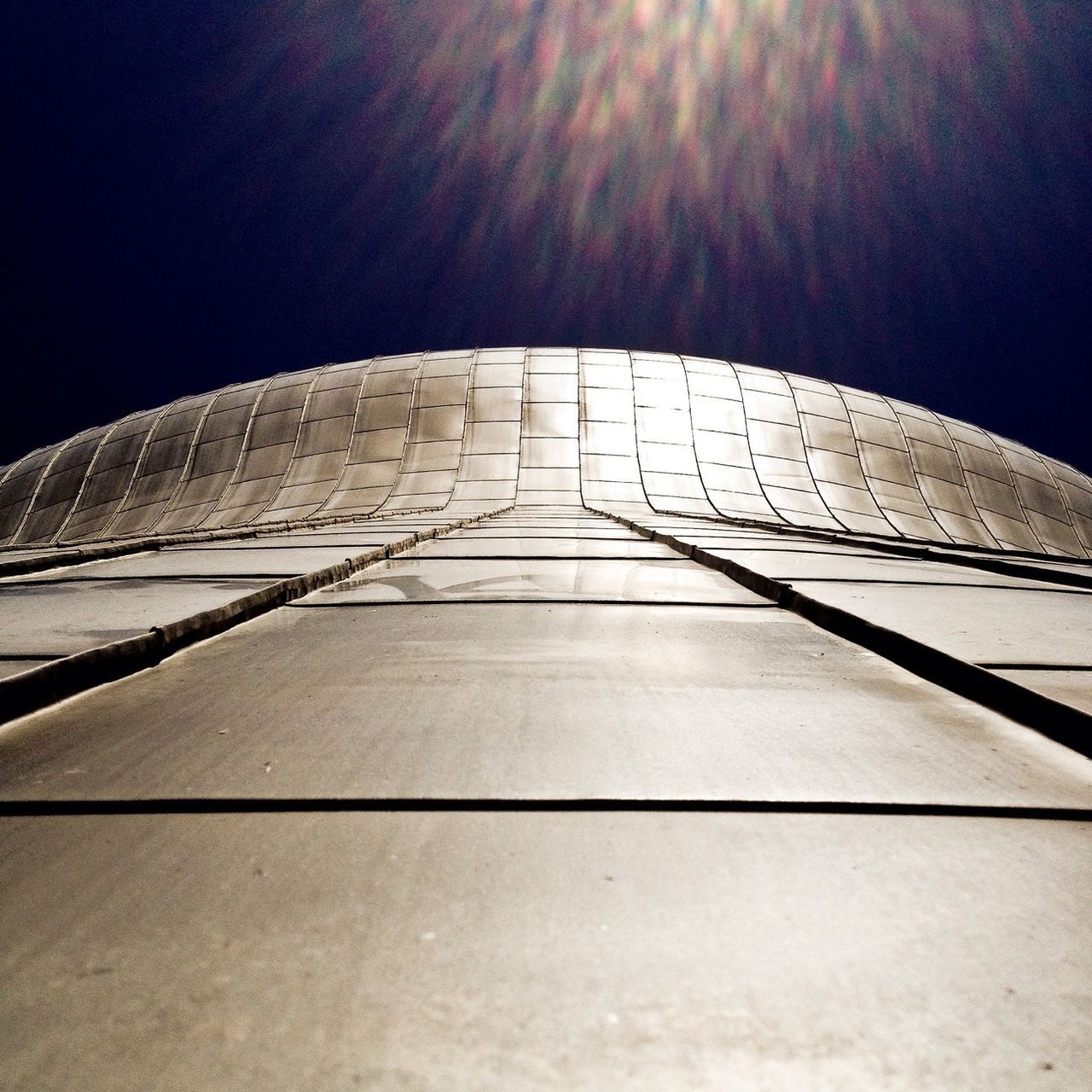 clear sky, architecture, built structure, the way forward, copy space, building exterior, night, low angle view, vanishing point, white color, diminishing perspective, road, no people, outdoors, pattern, sunlight, travel, travel destinations, white