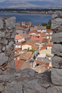 High angle view of town by sea