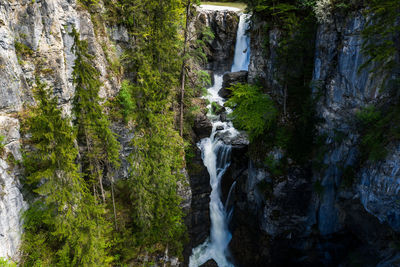 Aerial image of the beautiful aubach waterfalls in scheffau am tennengebirge near salzburg, austria.