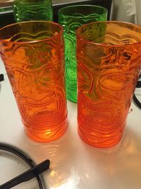 Close-up of colorful glass on table