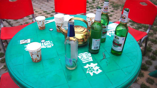 High angle view of various bottles on table