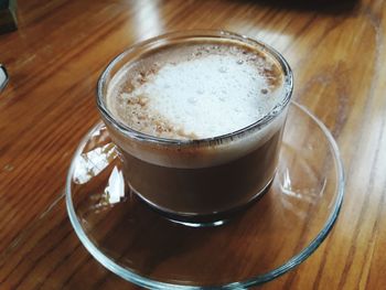 High angle view of coffee served on table