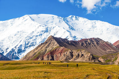 Scenic view of snowcapped mountain against sky