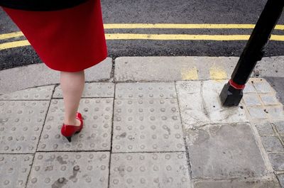 Woman on pavement