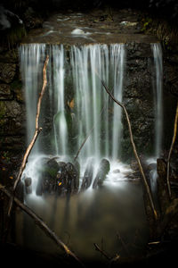 View of waterfall in forest