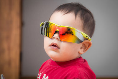 Close-up of baby boy wearing sunglasses