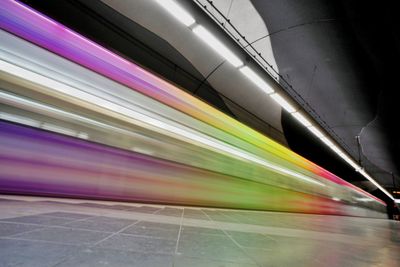 Blurred motion of train at subway station