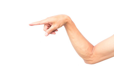 Close-up of hands over white background