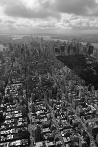 Aerial view of cityscape against sky