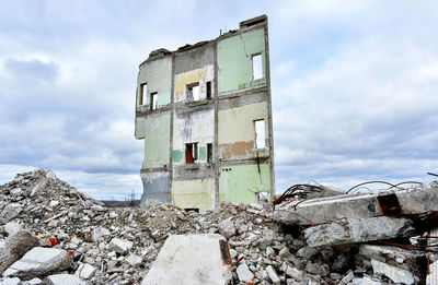 Abandoned building against sky