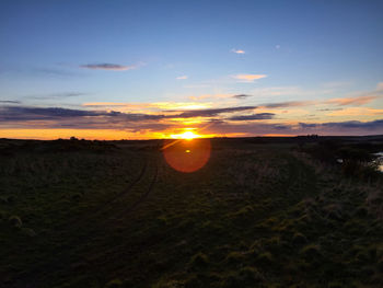 Sunset over field