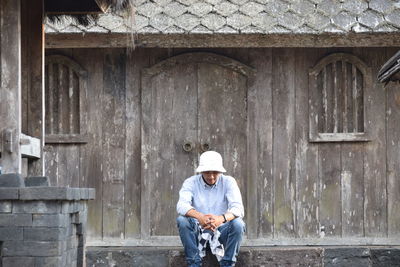 Full length of a man standing at construction site