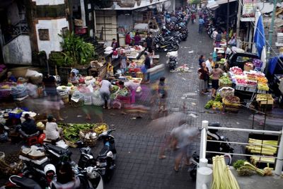 High angle view of people on street in city