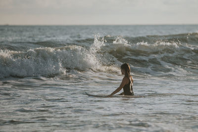 Man surfing in sea