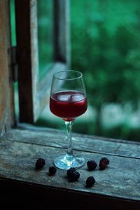 Close-up of wineglass on table