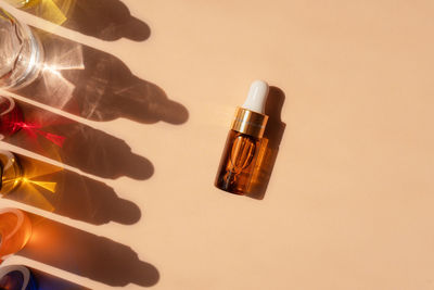 High angle view of bottles against white background