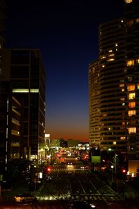 Modern buildings in city at night