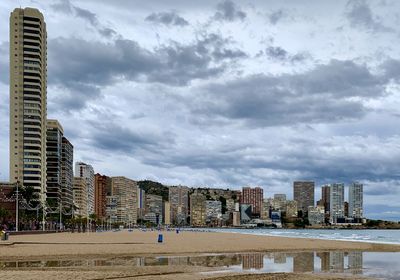 Modern buildings in city against sky