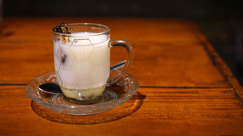 Close-up of tea cup on table