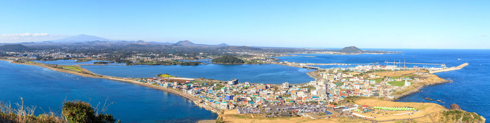 High angle view of sea against blue sky