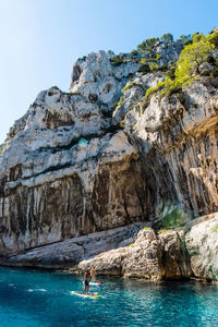 Scenic view of mountain by sea