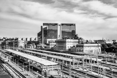 High angle view of train against buildings in city