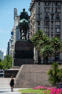 Man statue outside building