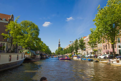 Boats moored in canal