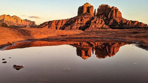 Reflection of rock formations in water