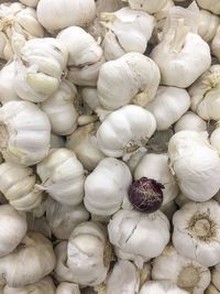 Full frame shot of onions for sale in market