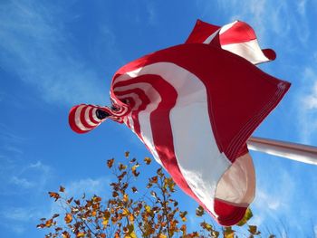 Low angle view of flag against sky