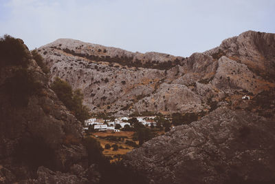 Scenic view of rocky mountains against clear sky