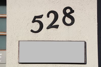 Close-up of text on wall