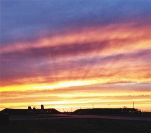 Scenic view of dramatic sky during sunset