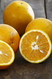 Close-up of oranges on table