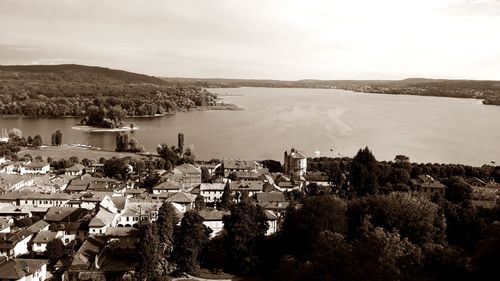 High angle view of townscape by sea